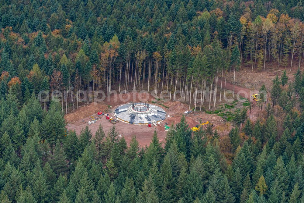 Ettenheim from the bird's eye view: Construction site for the construction of a steel and concrete foundation in a circular shape as a base for the installation of a WEA wind turbine - wind turbine in Ettenheim in the state Baden-Wuerttemberg, Germany