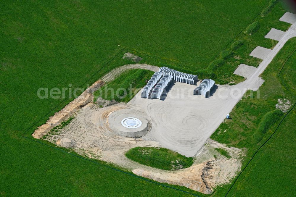 Krummensee from the bird's eye view: Construction site for the construction of a steel and concrete foundation in a circular shape as a base for the installation of a WEA wind turbine - wind turbine on street Wegendorfer Weg in Krummensee in the state Brandenburg, Germany