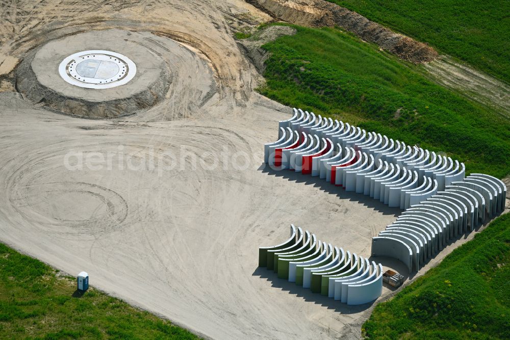 Krummensee from the bird's eye view: Construction site for the construction of a steel and concrete foundation in a circular shape as a base for the installation of a WEA wind turbine - wind turbine on street Wegendorfer Weg in Krummensee in the state Brandenburg, Germany
