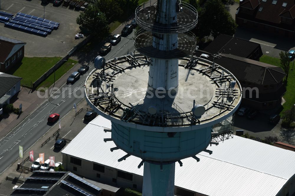 Aerial photograph Heide - Funkturm and transmission system as basic network transmitter and Fernmeldeturm on street Neuwerkstrasse in Heide in the state Schleswig-Holstein, Germany