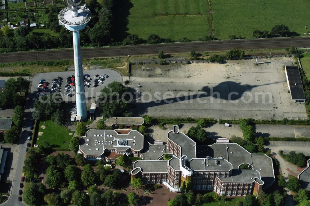 Heide from the bird's eye view: Funkturm and transmission system as basic network transmitter and Fernmeldeturm on street Neuwerkstrasse in Heide in the state Schleswig-Holstein, Germany