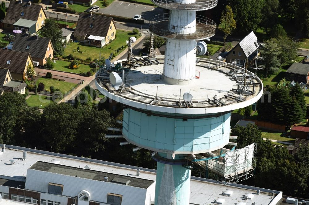 Aerial photograph Heide - Funkturm and transmission system as basic network transmitter and Fernmeldeturm on street Neuwerkstrasse in Heide in the state Schleswig-Holstein, Germany