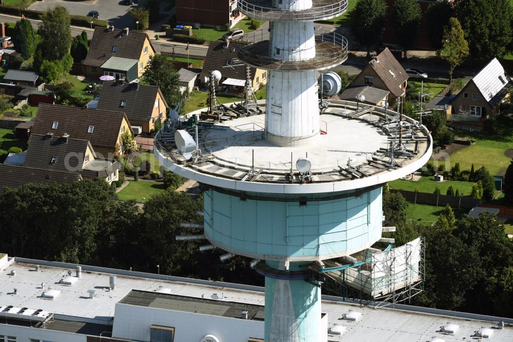 Heide from above - Funkturm and transmission system as basic network transmitter and Fernmeldeturm on street Neuwerkstrasse in Heide in the state Schleswig-Holstein, Germany