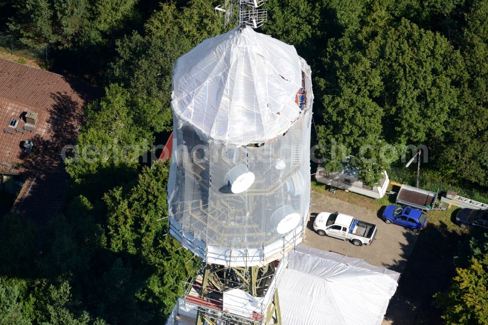 Maikammer from the bird's eye view: Radio tower and transmitter on the highest mountain of the Palatinate Forest, the Kalmit in Maikammer in the state Rhineland-Palatinate. Currently, renovation work will take place through the Werner Diener GmbH & Co. Industrieanstrich KG