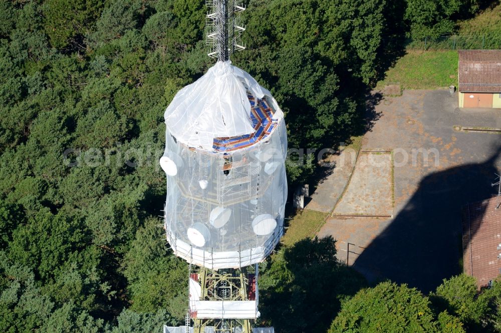 Aerial image Maikammer - Radio tower and transmitter on the highest mountain of the Palatinate Forest, the Kalmit in Maikammer in the state Rhineland-Palatinate. Currently, renovation work will take place through the Werner Diener GmbH & Co. Industrieanstrich KG