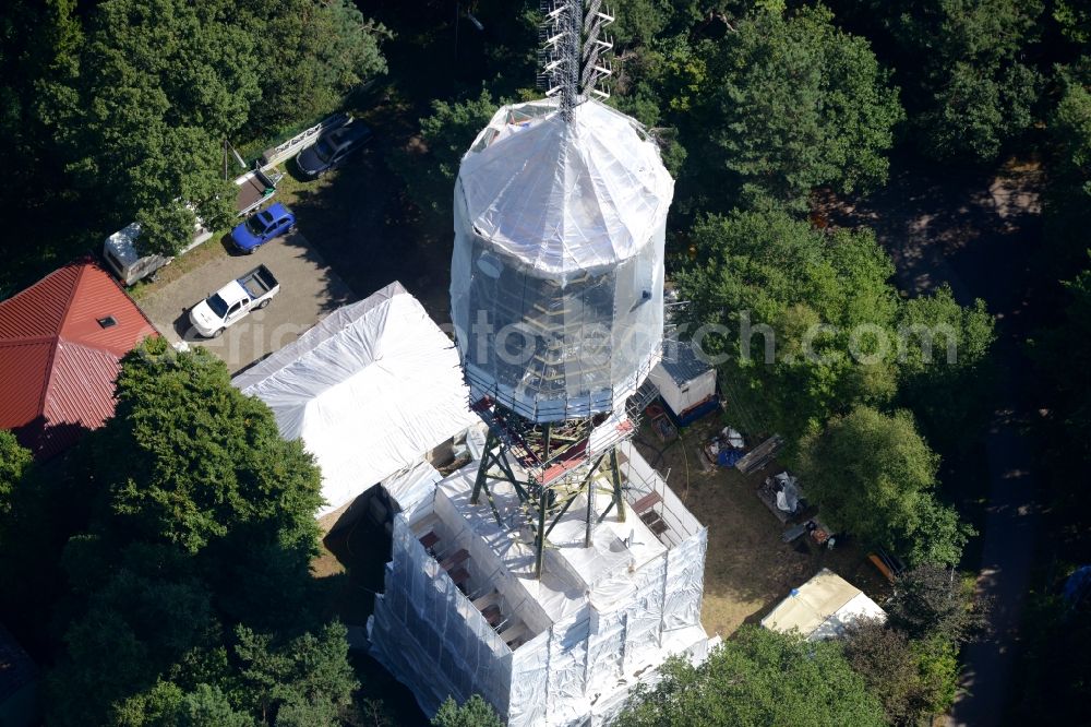 Maikammer from the bird's eye view: Radio tower and transmitter on the highest mountain of the Palatinate Forest, the Kalmit in Maikammer in the state Rhineland-Palatinate. Currently, renovation work will take place through the Werner Diener GmbH & Co. Industrieanstrich KG