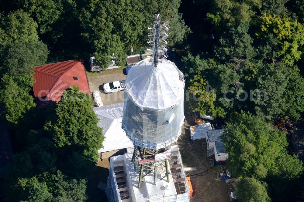 Aerial image Maikammer - Radio tower and transmitter on the highest mountain of the Palatinate Forest, the Kalmit in Maikammer in the state Rhineland-Palatinate. Currently, renovation work will take place through the Werner Diener GmbH & Co. Industrieanstrich KG