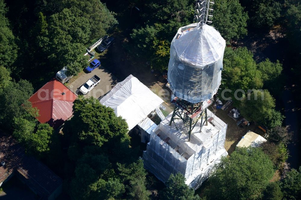 Aerial image Maikammer - Radio tower and transmitter on the highest mountain of the Palatinate Forest, the Kalmit in Maikammer in the state Rhineland-Palatinate. Currently, renovation work will take place through the Werner Diener GmbH & Co. Industrieanstrich KG