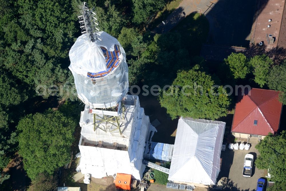 Aerial photograph Maikammer - Radio tower and transmitter on the highest mountain of the Palatinate Forest, the Kalmit in Maikammer in the state Rhineland-Palatinate. Currently, renovation work will take place through the Werner Diener GmbH & Co. Industrieanstrich KG