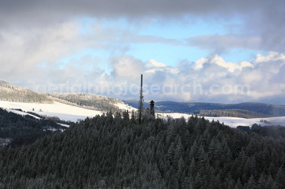 Aerial photograph Schopfheim - Radio tower, lookout tower and transmitter on the top of the mountain Hohe Moehr in the Black Forest in Schopfheim in Baden-Wuerttemberg. Clouds and fog patches are passing over the snow-capped mountain peak