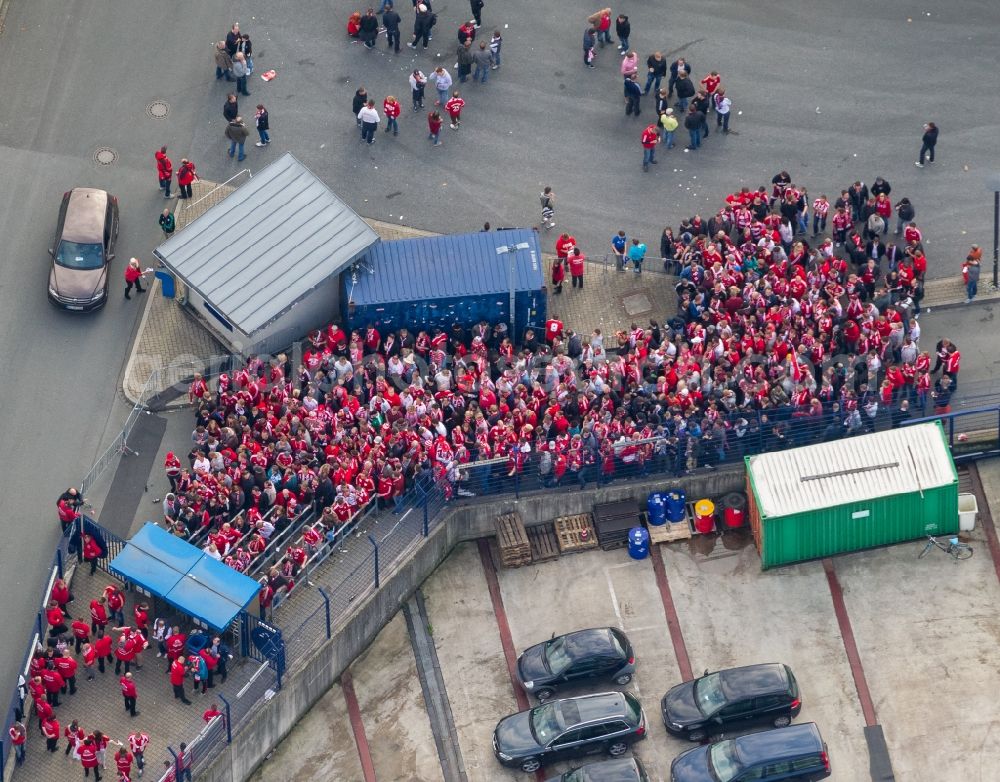 Gelsenkirchen from the bird's eye view: Football fans at Bundesliga match against Bayern Schalke in the grounds of the stadium Veltins Arena / Schalke stadium in Gelsenkirchen in North Rhine-Westphalia