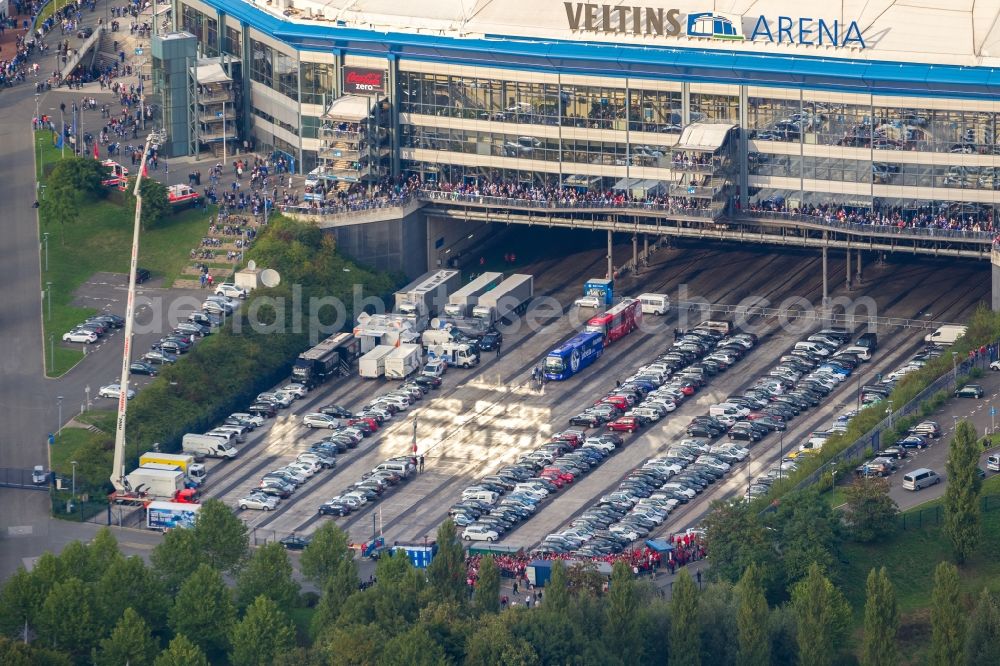 Aerial image Gelsenkirchen - Football fans at Bundesliga match against Bayern Schalke in the grounds of the stadium Veltins Arena / Schalke stadium in Gelsenkirchen in North Rhine-Westphalia