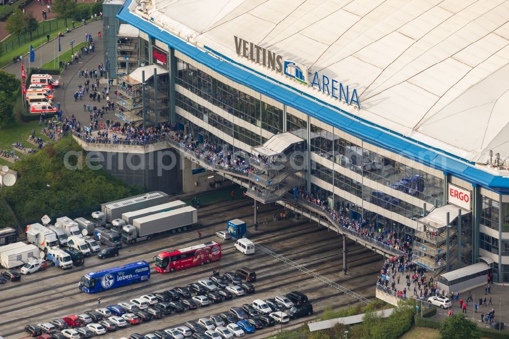 Gelsenkirchen from the bird's eye view: Football fans at Bundesliga match against Bayern Schalke in the grounds of the stadium Veltins Arena / Schalke stadium in Gelsenkirchen in North Rhine-Westphalia