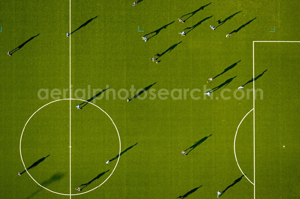 Dortmund from the bird's eye view: View of a Football game on a football field - artificial pitch in Dortmund in North Rhine-Westphalia