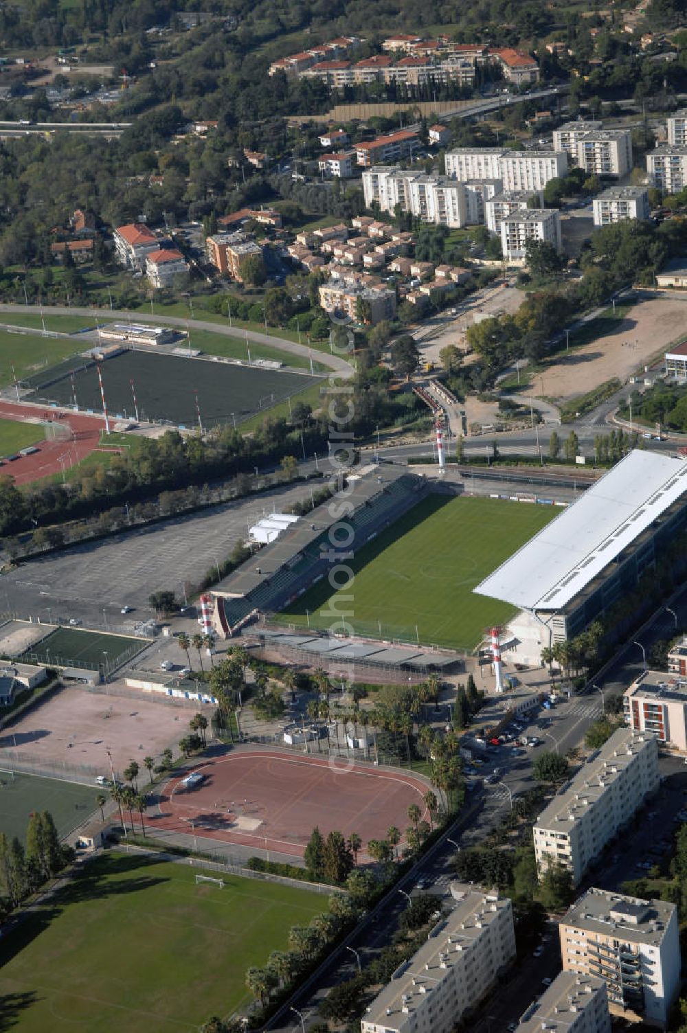 Aerial photograph Cannes - Blick auf das Fußballstadion Stade Pierre de Coubertin in Cannes. Plätze stehen für 12.800 Besucher zur Verfügung. Genutzt wird das Stadion hauptsächlich vom Fußballclub AS Cannes. Kontakt Verein: Association Sportive de Cannes, Avenue Pierre Poési, BP 103, 06150 Cannes - La Bocca, Tel. +33(0)492 195050, Fax +33(0)492 470713