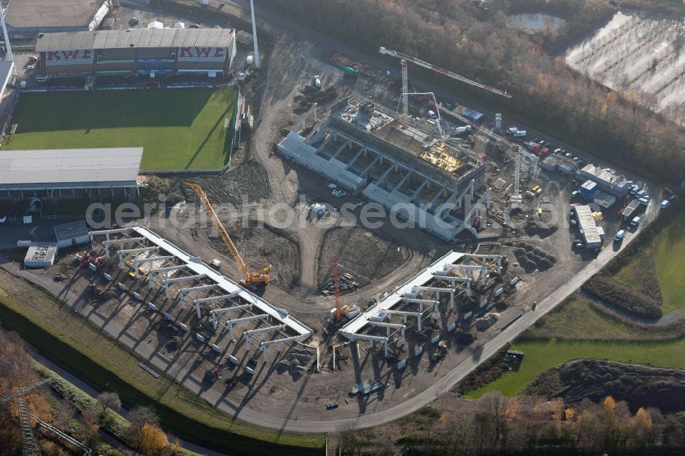 Essen from the bird's eye view: Umbau des Areales am Georg-Melches-Stadion vom Fußballclub Rot-Weiss Essen in der Stadt Essen, Nordrhein-Westfalen. Es wird ein neues Fußballstadion, welches ca. 20000 Zuschauern Platz bieten soll, leicht versetzt in unmittelbarer Nachbarschaft gebaut. Für die Arbeiten wurde das Bauunternehmen Köster Bau AG beauftragt. Construction of a modern football stadium at the Georg-Melches stadium in Essen, North Rhine-Westphalia.