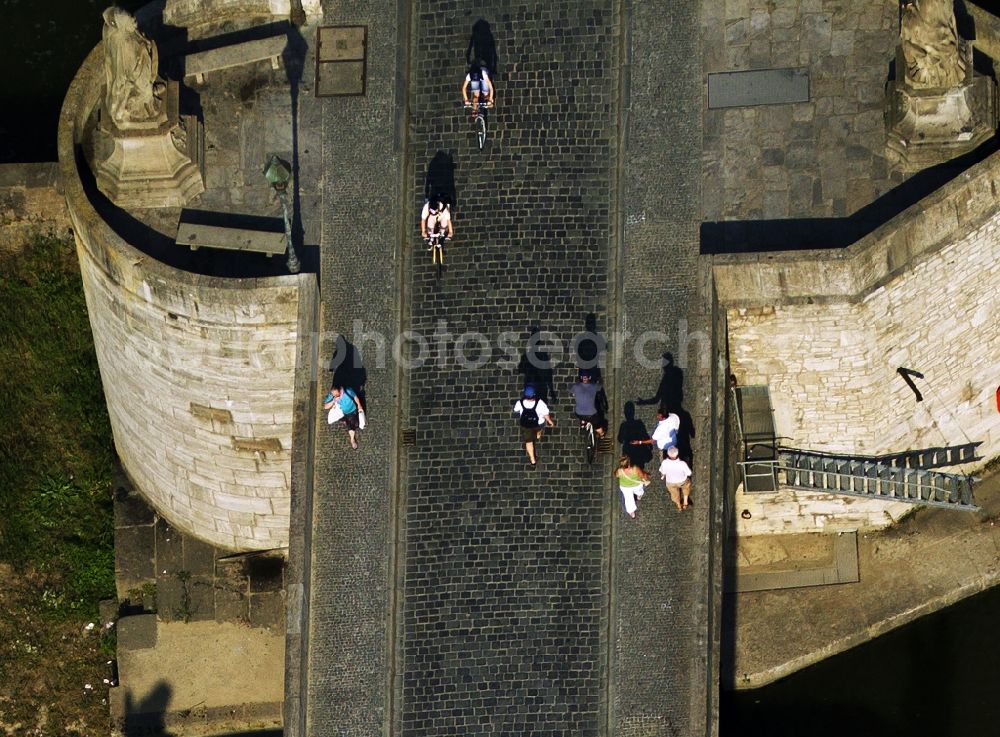 Aerial image Würzburg - Pedestrians on the Old Main bridge in Wuerzburg in the state of Bavaria. The bridge is the oldest bridge across the river in the town. Until 1886 it was its only passage across the river. On the bridge, several statues and memorials of saints and rulers are located