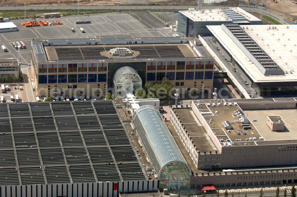 Frankfurt am Main from above - The Galleria, a 30 foot and 100 metres long glass arch, is situated between Exhibition Halls 8 and 9 at the street Theodor-Heuss-Allee 80 in Frankfurt at the Main in Hesse