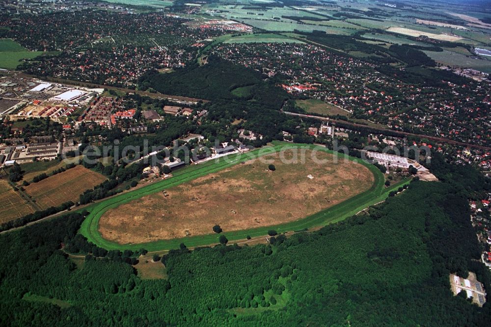 Hoppegarten from above - For nearly 150 are in Hoppe garden in the state of Brandenburg racecourse Hoppe garden. On the 430-acre site, which is under protection still find regular horse races