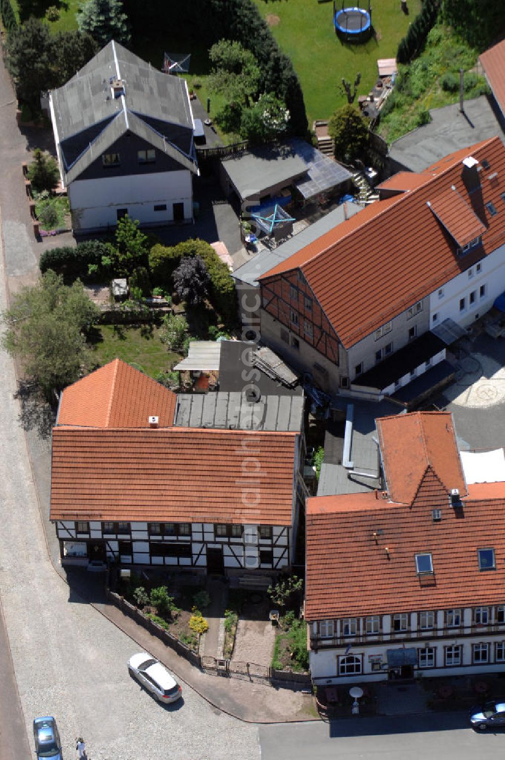 Aerial photograph Friedrichroda - Blick auf die Gaststätte und den Gasthof Brauhaus am Fuße des Finsterberger Weg an der Bachstrasse 14 in 99894 Friedrichroda. View of the restaurant Brauhaus in Friedrichroda.