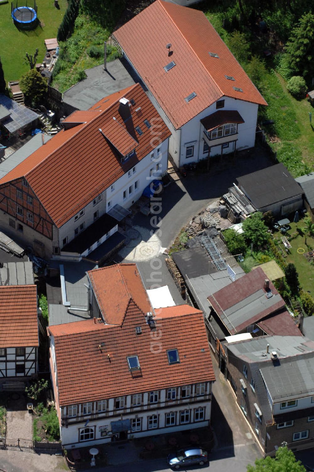 Aerial image Friedrichroda - Blick auf die Gaststätte und den Gasthof Brauhaus am Fuße des Finsterberger Weg an der Bachstrasse 14 in 99894 Friedrichroda. View of the restaurant Brauhaus in Friedrichroda.