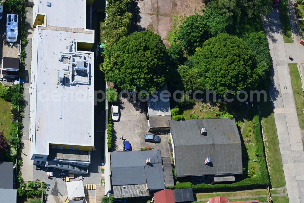 Berlin from above - Building complex and premises of the Sprockhoff car repair workshop on Gielsdorfer Strasse - Dirschauer Strasse in the Mahlsdorf district of Berlin, Germany