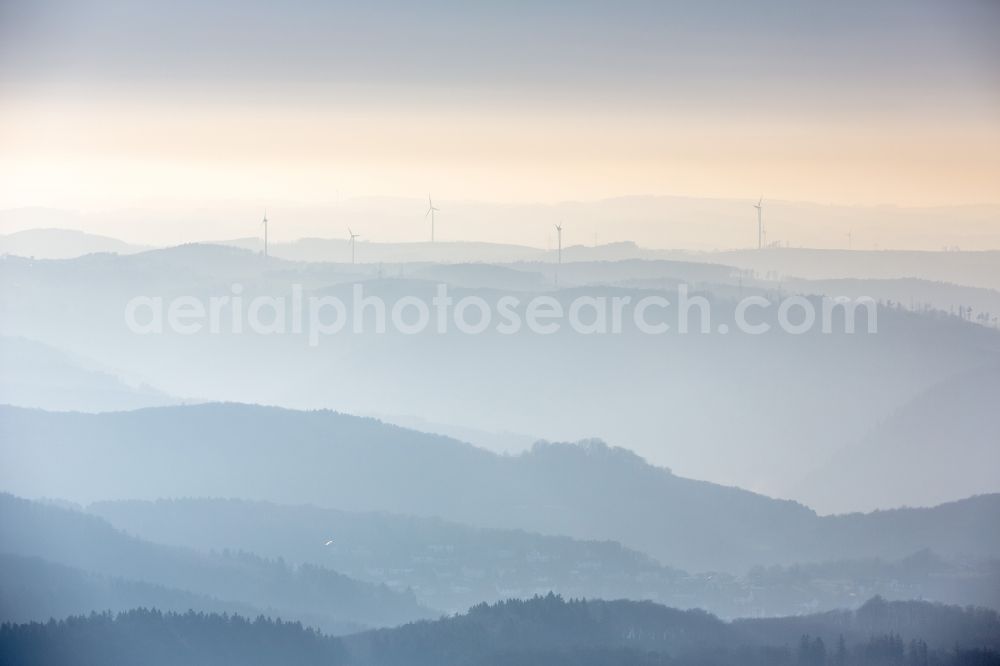 Aerial image Iserlohn - Relief over the mountains landscape in winter coverd with fog near Iserlohn in the state of Hesse