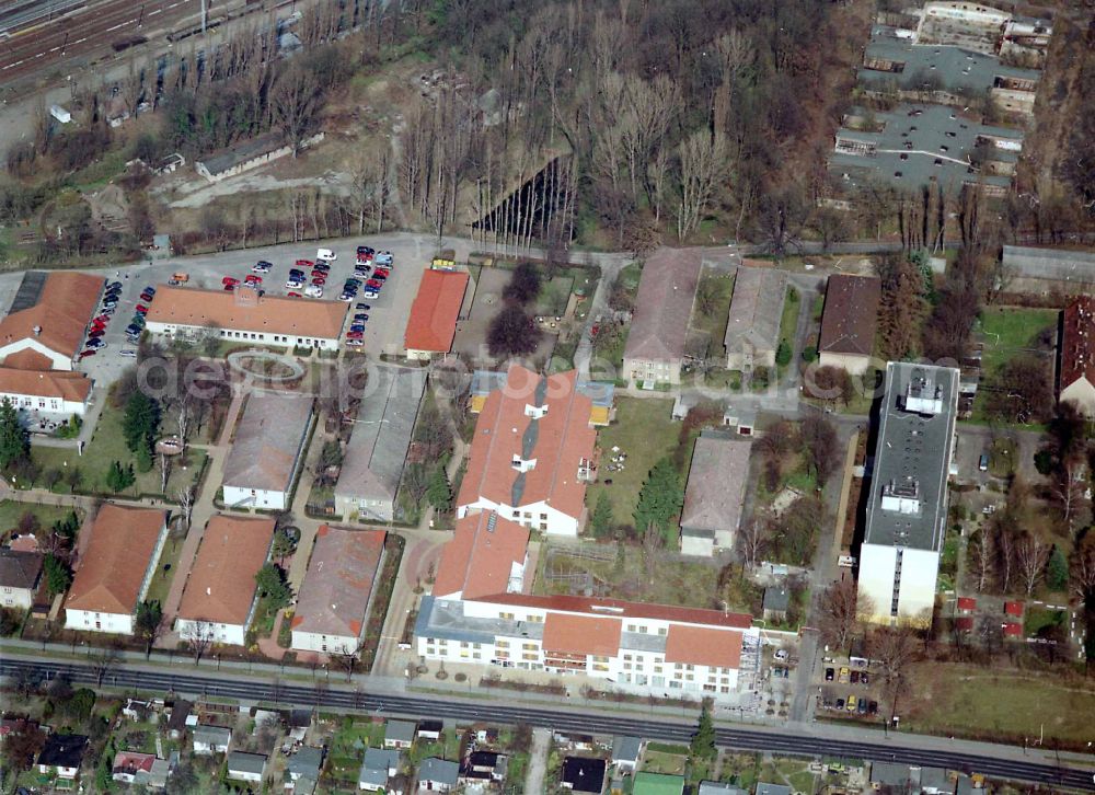 Berlin from the bird's eye view: Building the retirement home Die Albert Schweitzer Stiftung - Wohnen & Betreuen on street Bahnhofstrasse in the district Blankenburg in Berlin, Germany