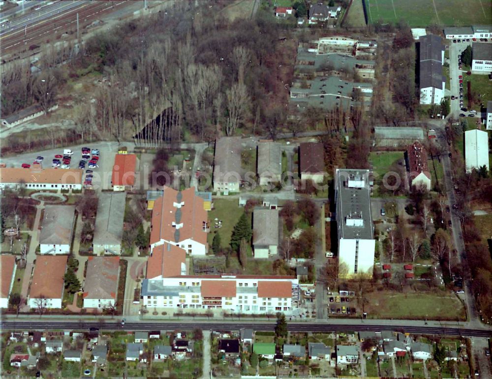 Berlin from above - Building the retirement home Die Albert Schweitzer Stiftung - Wohnen & Betreuen on street Bahnhofstrasse in the district Blankenburg in Berlin, Germany