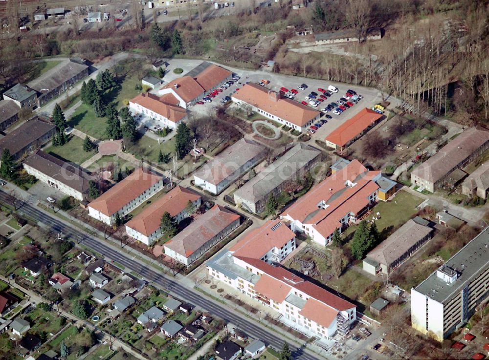 Aerial image Berlin - Building the retirement home Die Albert Schweitzer Stiftung - Wohnen & Betreuen on street Bahnhofstrasse in the district Blankenburg in Berlin, Germany