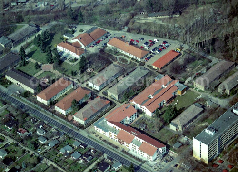 Berlin from the bird's eye view: Building the retirement home Die Albert Schweitzer Stiftung - Wohnen & Betreuen on street Bahnhofstrasse in the district Blankenburg in Berlin, Germany