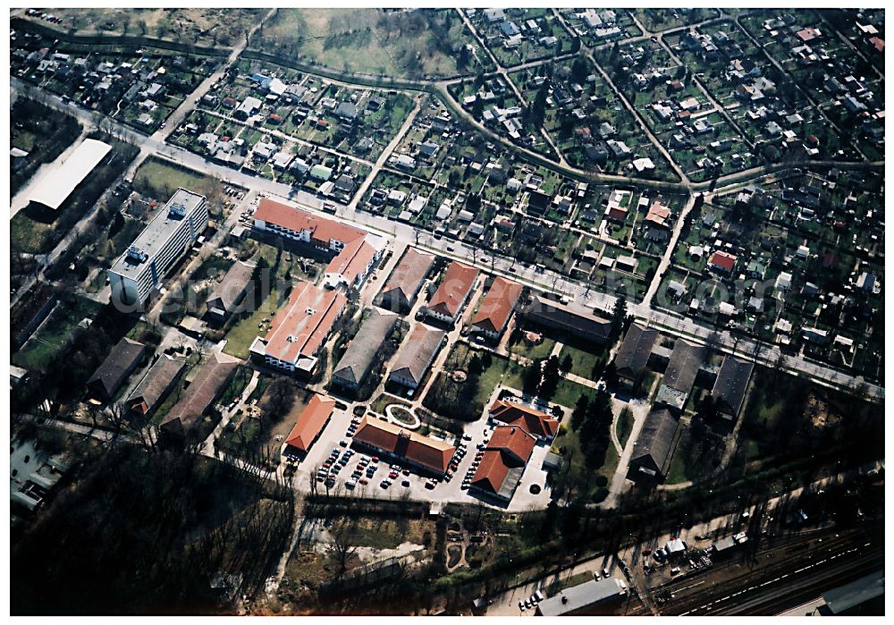 Aerial image Berlin - Building the retirement home Die Albert Schweitzer Stiftung - Wohnen & Betreuen on street Bahnhofstrasse in the district Blankenburg in Berlin, Germany