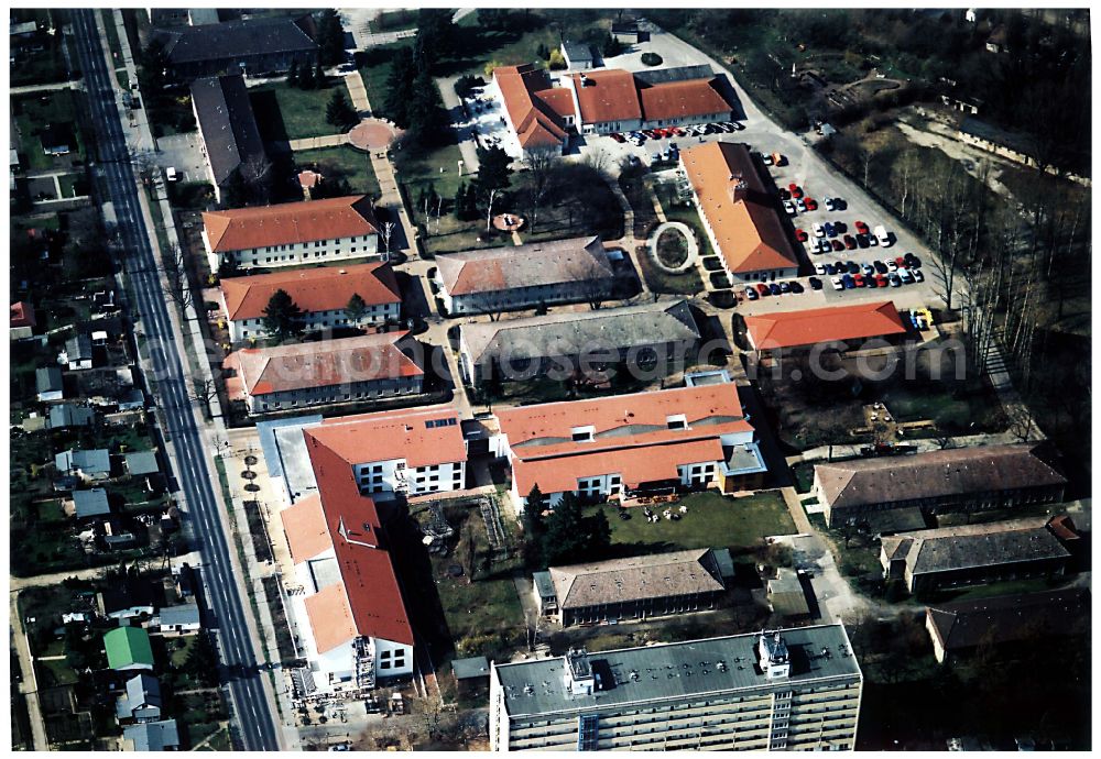 Aerial photograph Berlin - Building the retirement home Die Albert Schweitzer Stiftung - Wohnen & Betreuen on street Bahnhofstrasse in the district Blankenburg in Berlin, Germany