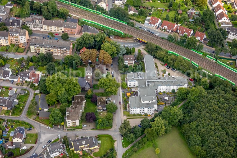 Aerial image Essen - Building of the retirement home of the Evangelische Altenwohnheim Essen-Dellwig gGmbH and the protestant church at the Schilfstrasse in Essen, North Rhine-Westphalia - NRW, Germany