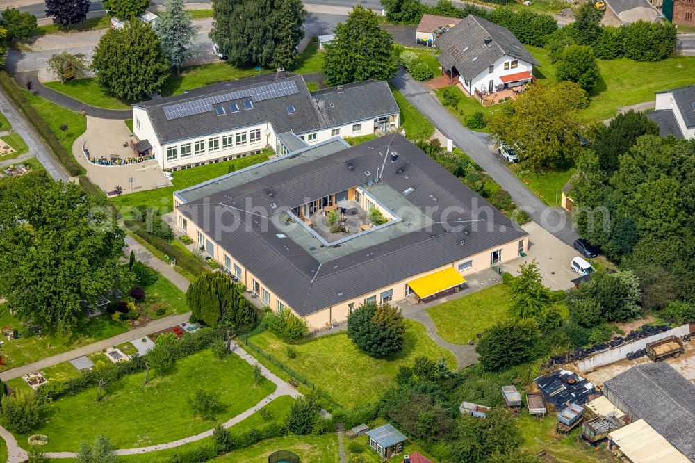 Fröndenberg/Ruhr from the bird's eye view: Building the retirement home Hans-Juergen-Janzen-Haus on street Brauerstrasse in the district Froemern in Froendenberg/Ruhr in the state North Rhine-Westphalia, Germany