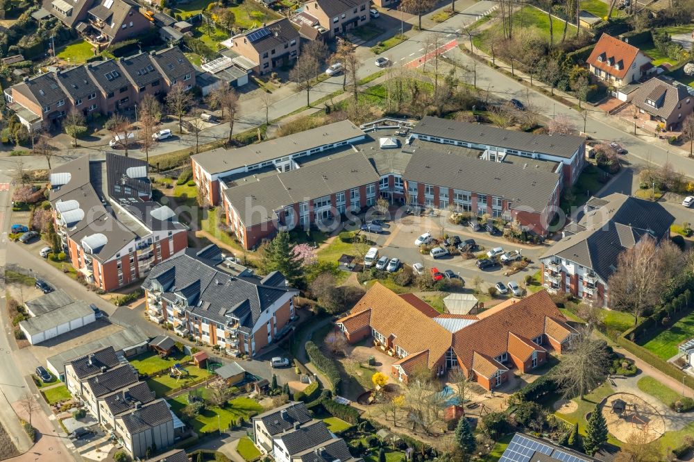 Hünxe from above - Building the retirement home Hewag Seniorenstift GmbH on Bensumskonp in Huenxe in the state North Rhine-Westphalia, Germany