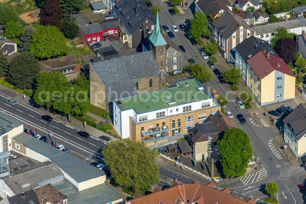 Herbede from the bird's eye view: Building of the retirement home - senior residence and the church on the Meesmannstrasse in Herbede in the state of North Rhine-Westphalia, Germany