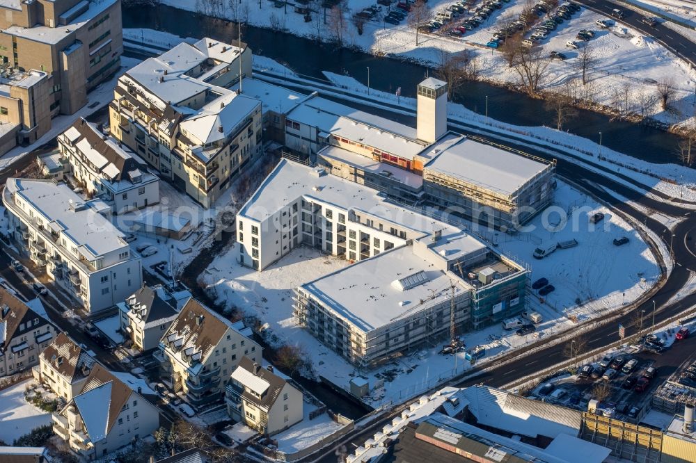 Meschede from above - Wintry snowy building the retirement home Siedlungs- und Baugenossenschaft Meschede eG „Rinschen Park“ in Meschede in the state North Rhine-Westphalia