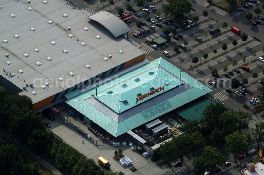 Aerial image Berlin - Building of the hardware store Hornbach in the Mariendorf part of Berlin in Germany. The branch includes a large parking lot and turquoise roof