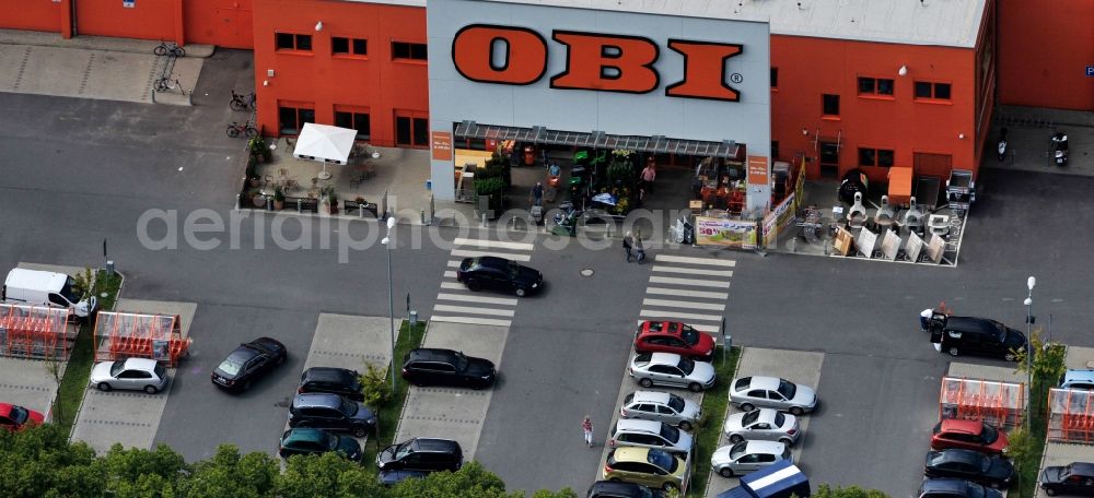 Bernau from the bird's eye view: Building of the construction market OBI on J.-F.-A Johann-Friedrich-A.-Borsig-Strasse in Bernau in the state Brandenburg, Germany