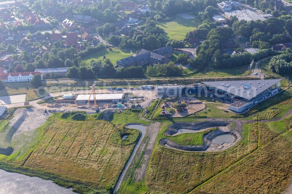 Tönning from the bird's eye view: Building the visitor center Nationalpark-Zentrum Multimar Wattforum in Toenning with Construction site for the new otter department in the state Schleswig-Holstein, Germany