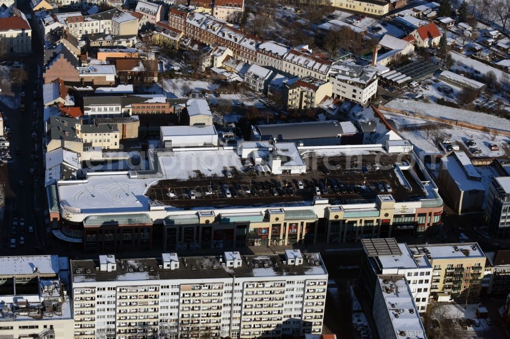 Aerial photograph Brandenburg an der Havel - Building of the shopping mall Sankt Annen Galerie in the snow-covered town centre of Brandenburg an der Havel in the state of Brandenburg