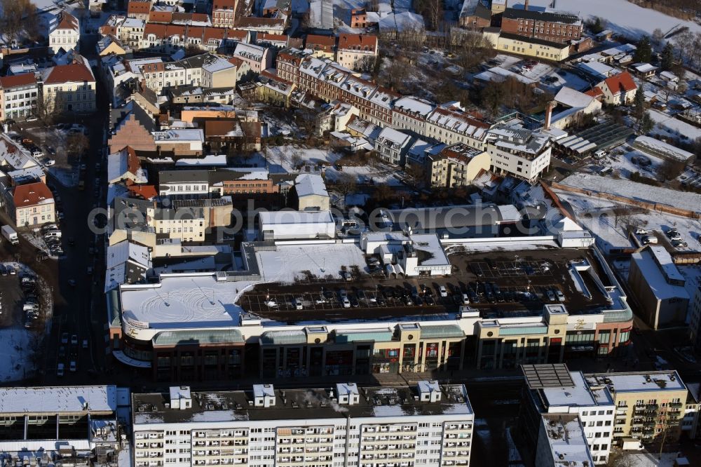 Brandenburg an der Havel from above - Building of the shopping mall Sankt Annen Galerie in the snow-covered town centre of Brandenburg an der Havel in the state of Brandenburg