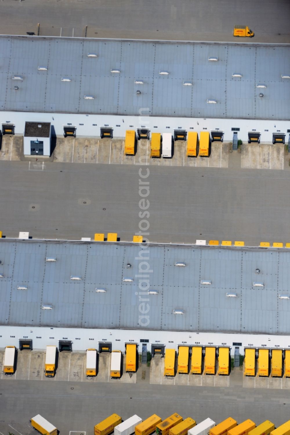 Rüdersdorf from the bird's eye view: Building DHL logistics hub and distribution center of the Deutsche Post Ruedersdorf in Brandenburg