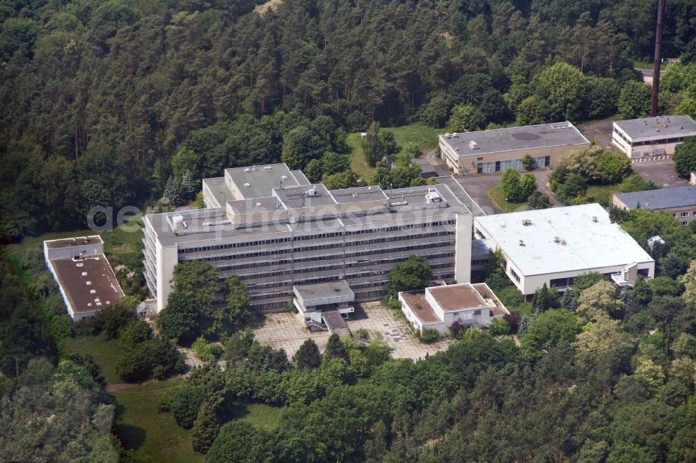 Aerial image Berlin - Building of the former hospital of the Stasi Ministry for State Security of the GDR at the Hobrechtsfelder Chaussee Street / Wiltbergstraße in Berlin-Buch