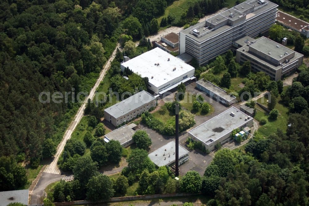 Berlin from above - Building of the former hospital of the Stasi Ministry for State Security of the GDR at the Hobrechtsfelder Chaussee Street / Wiltbergstraße in Berlin-Buch