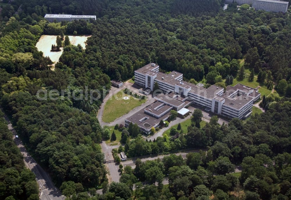 Berlin from the bird's eye view: Building of the former hospital of the Stasi Ministry for State Security of the GDR at the Hobrechtsfelder Chaussee Street / Wiltbergstraße in Berlin-Buch