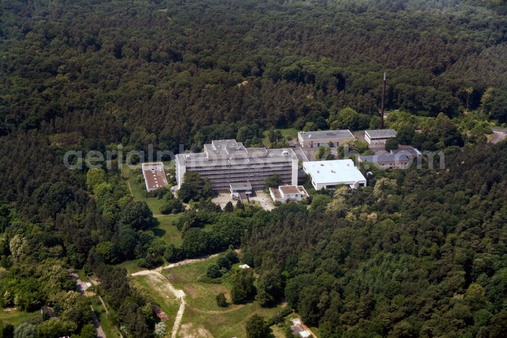 Aerial image Berlin - Building of the former hospital of the Stasi Ministry for State Security of the GDR at the Hobrechtsfelder Chaussee Street / Wiltbergstraße in Berlin-Buch