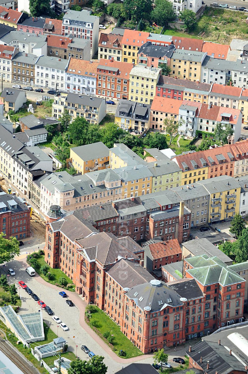 Aerial image Schwerin - 06/22/2011 Schwerin View of the building of the former railroad administration Schwerin behind the main train station