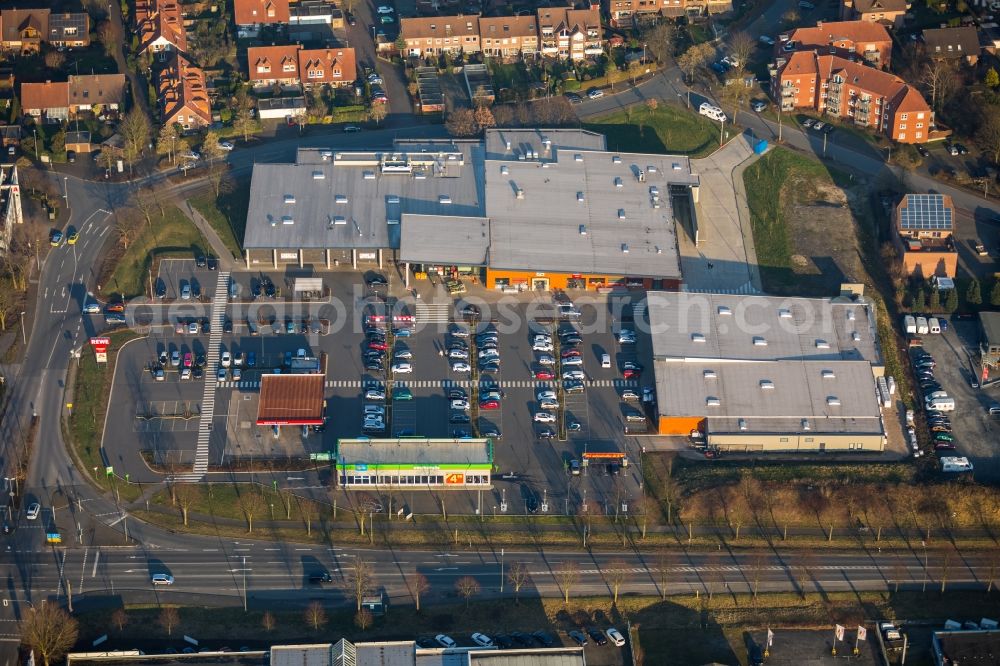 Dorsten from above - Buildings of the shopping center dm-drogerie markt and Rewe in Dorsten in the state North Rhine-Westphalia, Germany